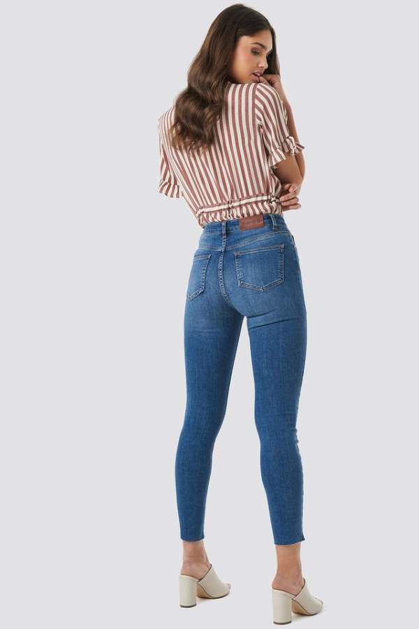 Women Mid-Rise Clean Look Stretchable Cropped Jeans  - Side View - AceCart