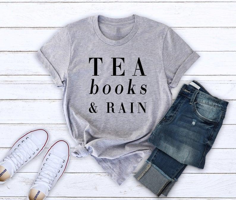 Tea books and rain shirt saying tshirt teen gifts graphic tee shirt - Front View - AceCart