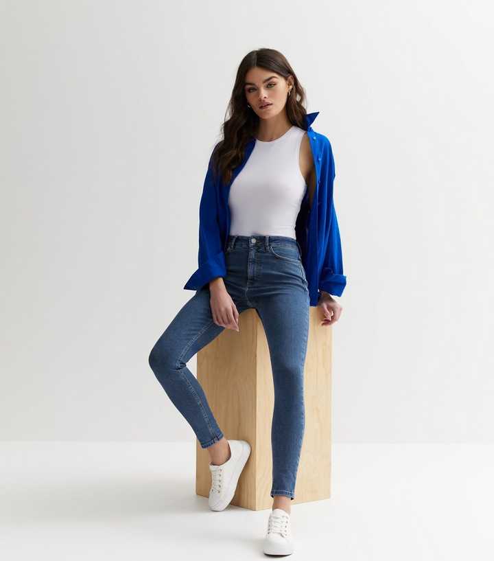 Blue Mid Rise Skinny Jeans - Front View - AceCart