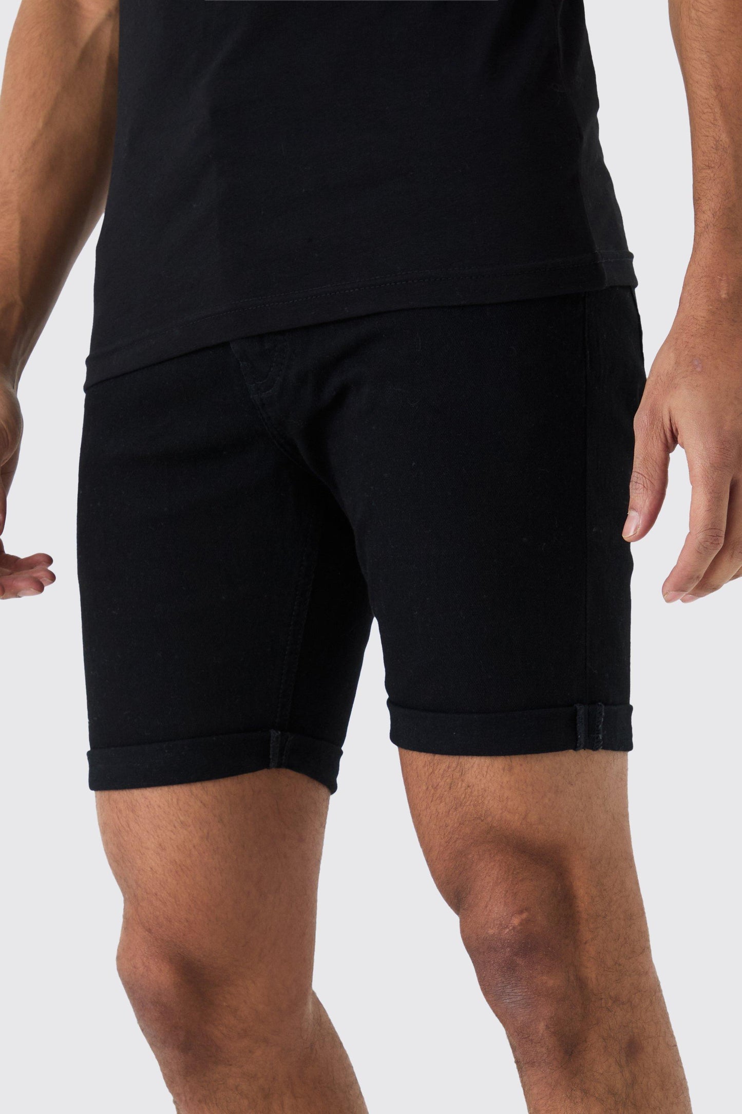 SKINNY STRETCH DENIM SHORTS IN BLACK