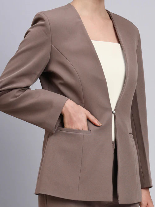 Close up beige brown powersuit fabric stitching premium quality women suit