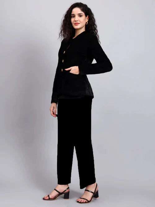 Side view black velvet pantsuit women gold button blazer and trousers set
